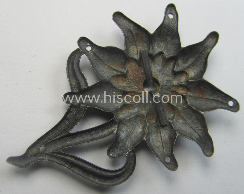 WH (Heeres) (darkened) silverish- (ie. golden-) coloured, zinc-based (and neatly maker- ie. 'F&B'-marked) so-called: 'M43'-pattern 'Edelweiss'-cap-badge (ie. 'Mützenabzeichen')