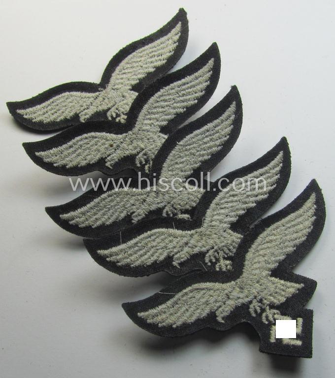 Attractive, WH (Luftwaffe) cap-eagle (being a 'standard-issue'-pattern example as executed onto a black-coloured and woolen-based  background and as such intended for usage on the black-coloured work- ie. 'HG'-related side-caps ie. 'Schiffchen'...