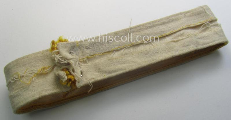 WH cuff-title (ie. 'Ärmelstreifen') entitled: 'Kreta' (being an example that bears a printed 'RbN.'-numeral and that comes in an issued-, clearly worn- and/or most certainly once tunic-attached, condition)