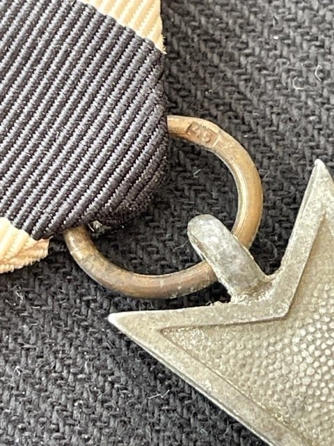 GERMAN WWII WAR MERIT CROSS 2nd CLASS WITH SWORDS NUMBERED RING 45 PRODUCED BY JULIUS BAUER SOHNE.