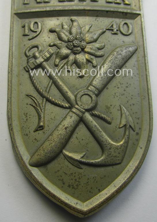 'Virtually mint' - albeit regrettably incomplete - example of a WH (Kriegsmarine) 'Narvik'-campaign-shield as executed in typical: 'Feinzink' (as was presumably produced by the: 'Wilhelm Deumer'-company)