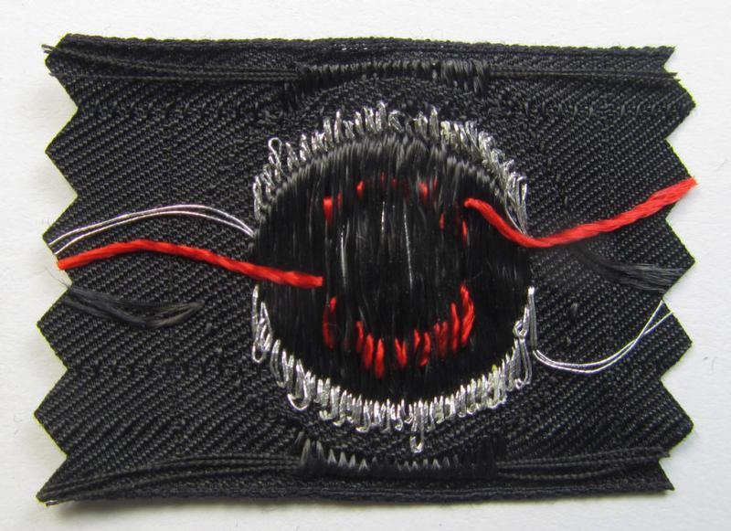 Superb - and rarely found! - WH (Heeres) Pz-cap-cocarde as executed in flatwire 'BeVo'-weave pattern onto a black-coloured background as was intended for usage on the black-coloured Pz-officer-type side-caps (ie. 'Schiffchenmützen')