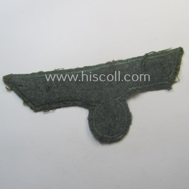 WH (Heeres) breast-eagle as executed in 'BeVo'-type-, so-called: 'flat-wire'-weave-pattern and pre-mounted on field-grey-coloured wool as was specifically intended for usage by soldiers (ie. NCOs) on their dress-tunics (ie. 'Waffenröcke')