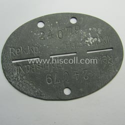Zinc-based, WH (LW) ie. 'Flieger'-related ID-disc bearing the...