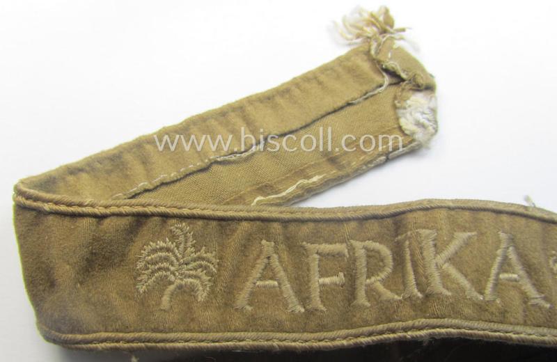 WH cuff-title (ie. 'Ärmelstreifen') entitled: 'Afrika' (being a minimally shortened example that comes in an overall very nice- (ie. issued and clearly worn ie. once tunic-attached-), condition
