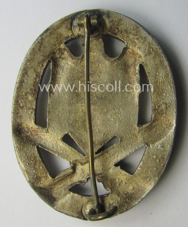'Allgemeines Sturmabzeichen' (or: General Assault Badge ie. GAB) being a typical unmarked, zinc-based- (ie. 'Feinzink'-) and/or: 'semi-hollow-back'-version as was (I deem) produced by the: 'Rudolf Karneth'-company