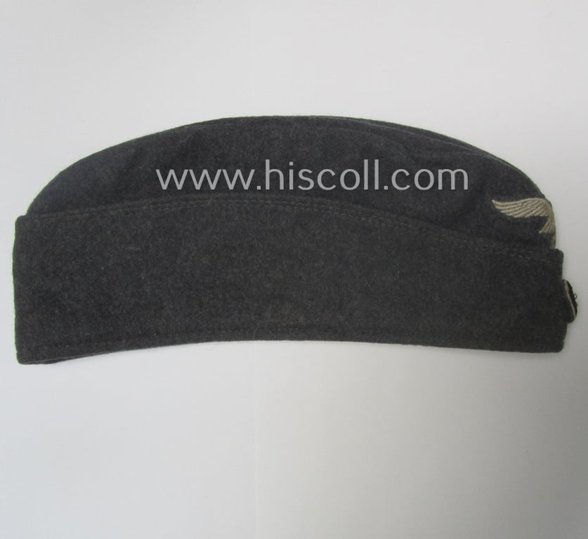 Attractive - albeit moderately used- ie. worn - WH (Luftwaffe) bluish-grey-coloured, EM- (ie. NCO-) type side-cap (ie. 'Schiffchenmütze für Mannschaften u. Unteroffiziere der Luftwaffe')