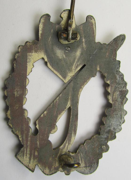 'Infanterie Sturmabzeichen in Silber' (or: silver infantry assault badge ie. IAB) as executed in zinc-based metal (ie. 'Feinzink') being a truly converse-shaped- (albeit non-maker-marked) example as was produced by the: 'Dr. Franke & Co.'-compa...