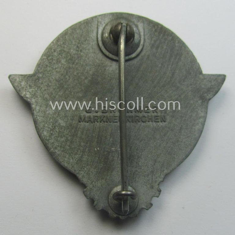 Superb - and truly scarcely encountered! - 'Feinzink'-based HJ (ie. 'Hitlerjugend') so-called: 'Reichsberufswettkampf-Siegerabzeichen' of the 2nd model, 'Gausieger 1944', being a clearly maker- (ie.: 'Gustav Brehmer'-) marked example