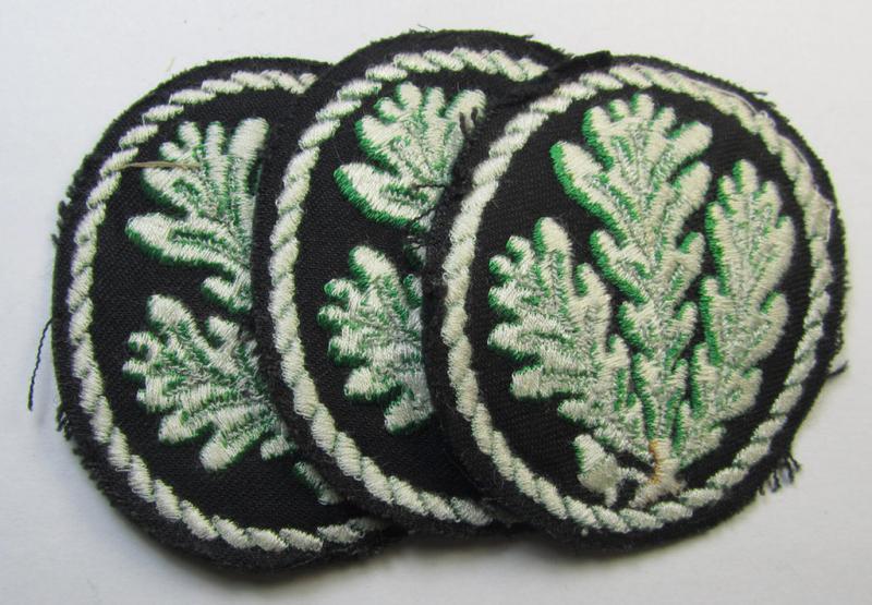 Attractive example of a WH (Heeres) so-called: 'Jäger'-armbadge, being a neatly machine-embroidered- and/or multi-coloured version as was executed on darker-green-coloured wool