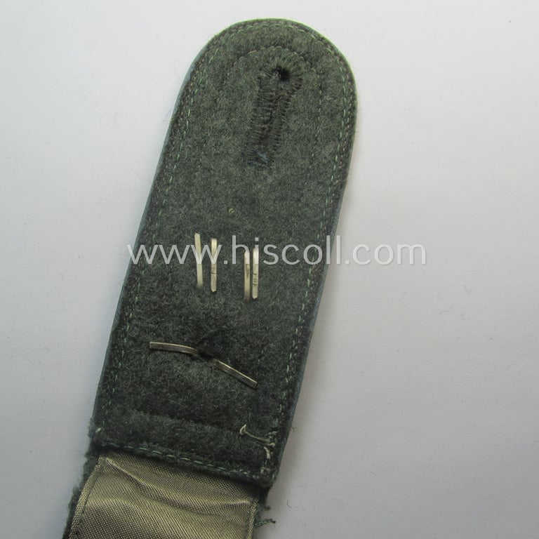 Single, so-called: 'M41 o. M43'-pattern, 'cyphered' WH (Heeres) NCO-type shoulderstrap as was intended for a: 'Feldwebel des Nachschub-Abtgs. 33'