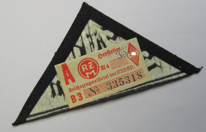 Rarely seen HJ/BDM (ie. 'Hitlerjugend' or: 'Bund Deutsche Mädel') district-triangle (ie. 'Gebietsdreieck') entitled: 'Süd Schwaben' (being a 'virtually mint- ie. unissued' example that shows its period-attached 'RzM-etiket')