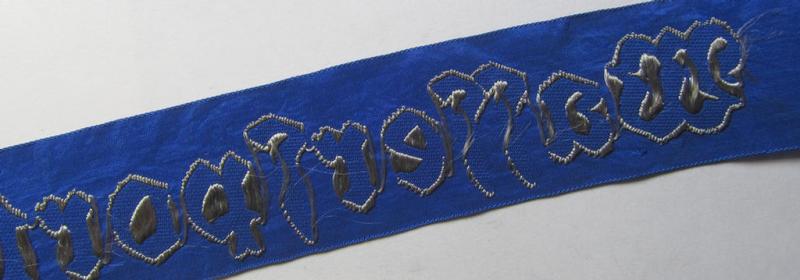 Superb - and with certainty very rarely encountered! - Marine-HJ (ie. 'Marine-Hitlerjugend') cap-tally (ie. 'Mützenband') entitled: 'Wassersportschule Seemoos' (being a full-length example that comes in an overall nice condition)