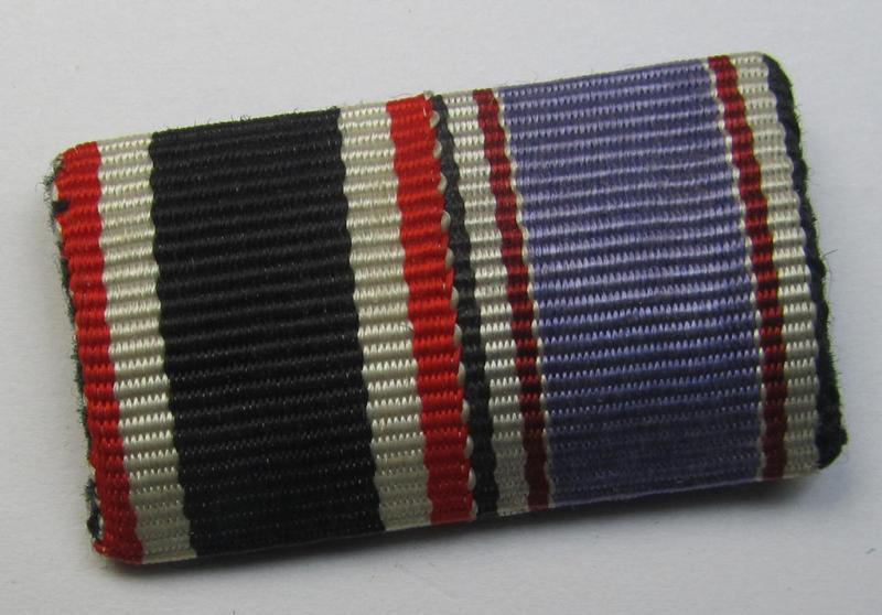 Neat two-pieced, WWII-period ribbon-bar (ie. 'Feld- o. Bandspange') as was intended for the combination: 'KvK II. Klasse ohne Schwertern' and a: 'Luftschutz-Ehrenzeichen 2. Stufe'