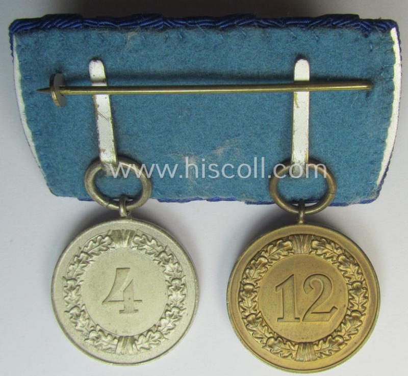 2-pieced medal-bar (ie. 'Spange') showing two: WH (Heeres o. Kriegsmarine) so-called: 'Dienstauszeichnungen für 4 u. 12 Jahre Treue Dienste' that both come period-mounted as a so-called: 'Doppelspange'
