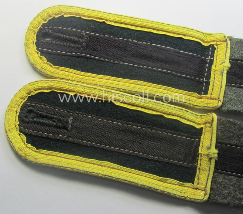 Pair of later-war-period, WH (Heeres) so-called: 'M44'-styled ie. 'simplified', EM-type shoulderstraps (as very unusually executed in darker-green wool!)  as intended for a: 'Soldat eines Nachr.-Rgts. o. Abts.'