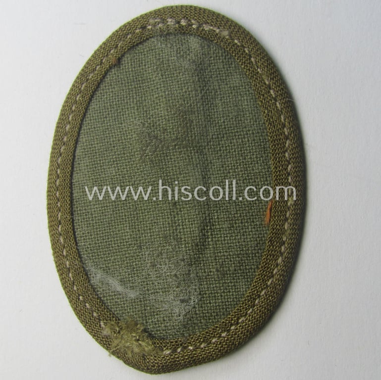 WH (Heeres) 'tropical-styled', trade- and/or special-career insignia (or: 'Signal Blitz') as was intended for a soldier who served within the: 'Kradschützenbtle. der Pz. Div. u. Inf. Divisione (mot.)'