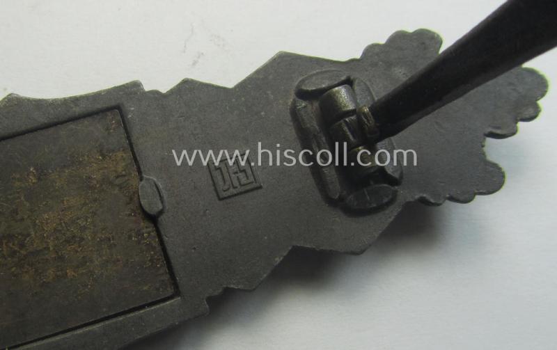 'Nahkampfspange in Bronze' (or: bronze-class close-combat clasp ie. CCC) being a neatly maker-marked- and/or minimally converse-shaped specimen as was produced by the: 'JFS'- (ie. 'Joseph Feix u. Söhne'-) company