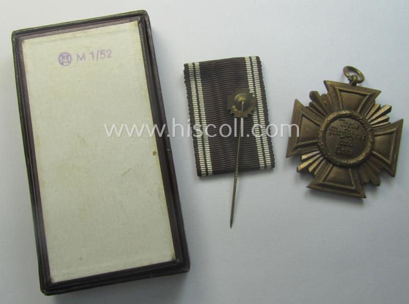 'N.S.D.A.P. D.A. in Bronze' (ie. '3. Stufe für 10 Jahre t. D.') being a non-maker-marked example that comes stored with its accompanying miniature(!) in its typical two-pieced 'RzM M1/52'-marked etui