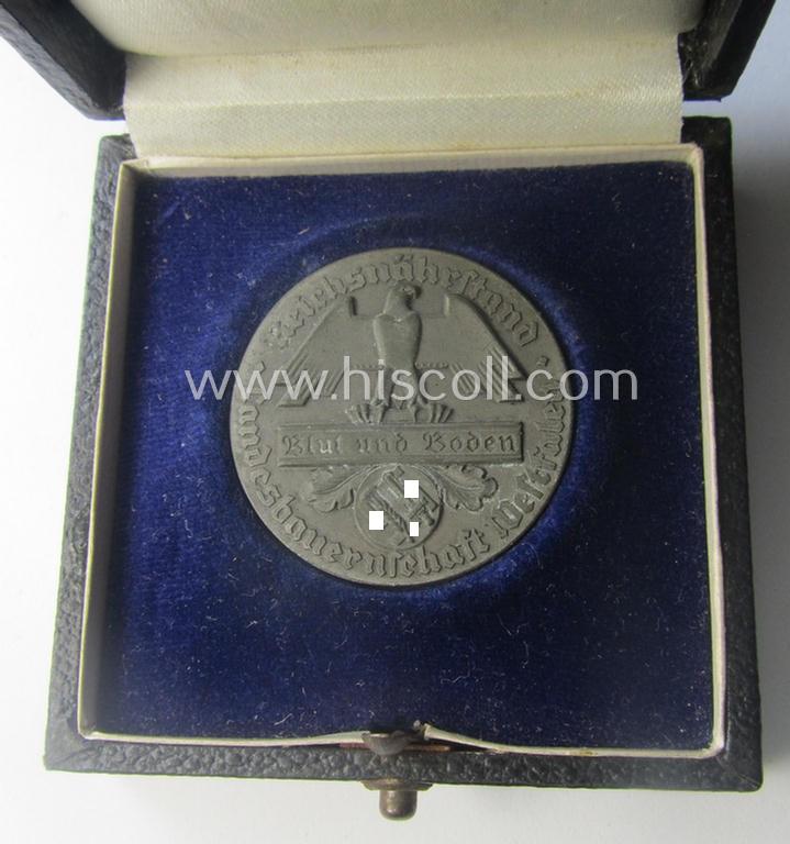 Greyish-silver-toned, 'Reichsnährstand'- (ie. 'RNSt.'-) related, commemorative-award-plaque entitled: 'Reichsnährstand - Landesbauernschaft - Blut und Boden - für züchterische Leistungen' and that comes stored in its period etui