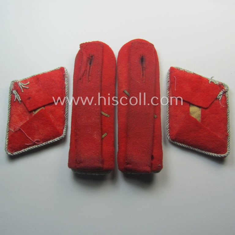 Truly used- and/or worn, 4-pieced WH (LW) insignia-set comprising of a pair of hand-embroidered, WH (Luftwaffe) officers'-type collar-patches and dito shoulderboards: 'Hauptmann der Flak-Artillerie-Trpn.'