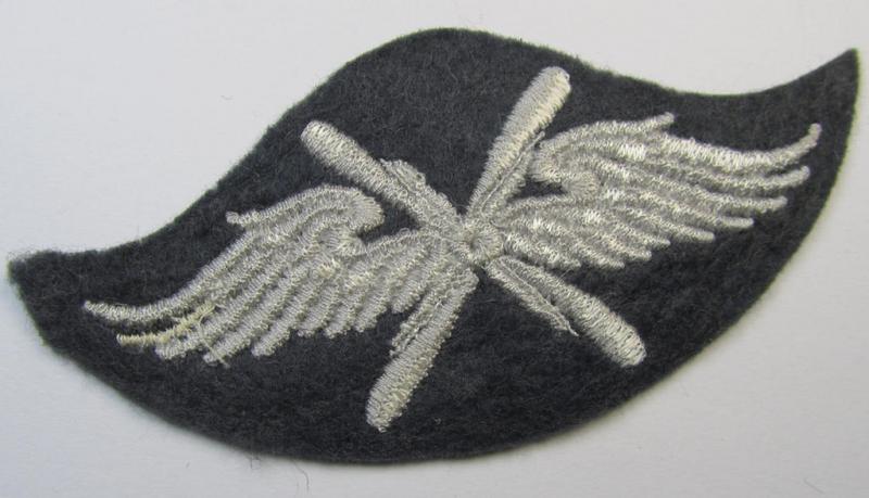 Machine-embroidered, WH (Luftwaffe) trade- ie. special-career-patch as was specifically intended for: 'Fliegendes Personal' and that comes in a possibly issued- albeit 'virtually mint' and/or never tunic-attached, condition