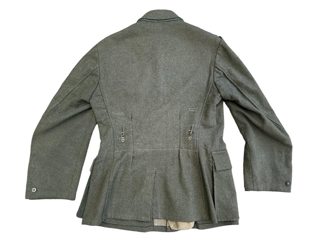 Wehrmacht Heer M43 EM field tunic With Original Applied Insignia