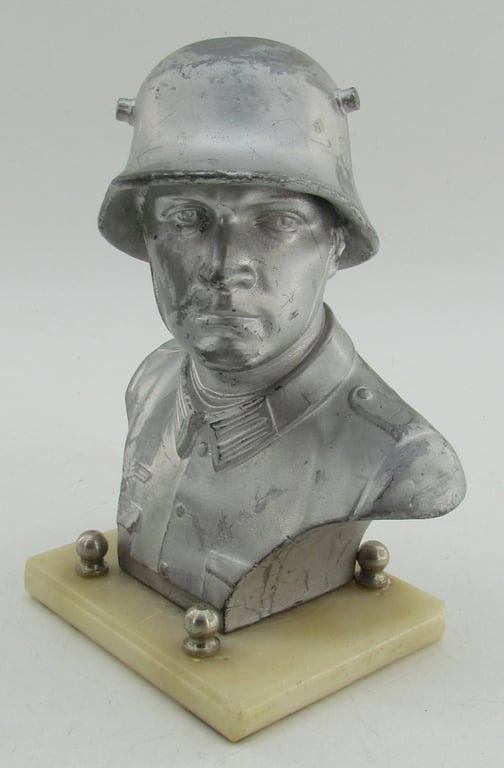 “German Wehrmacht soldier bust desk decoration on marble base.”