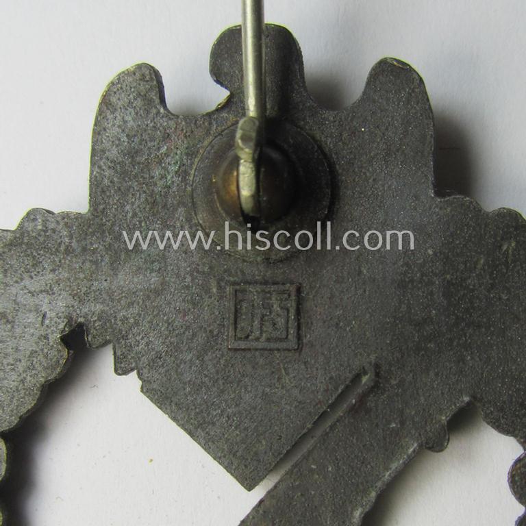 'Infanterie Sturmabzeichen in Bronze' being a maker- (ie. 'JFS'-) marked, 'solid-back' example by the desirable maker: 'Josef Feix u. Söhne' as was executed in golden-bronze-coloured, zinc-based metal