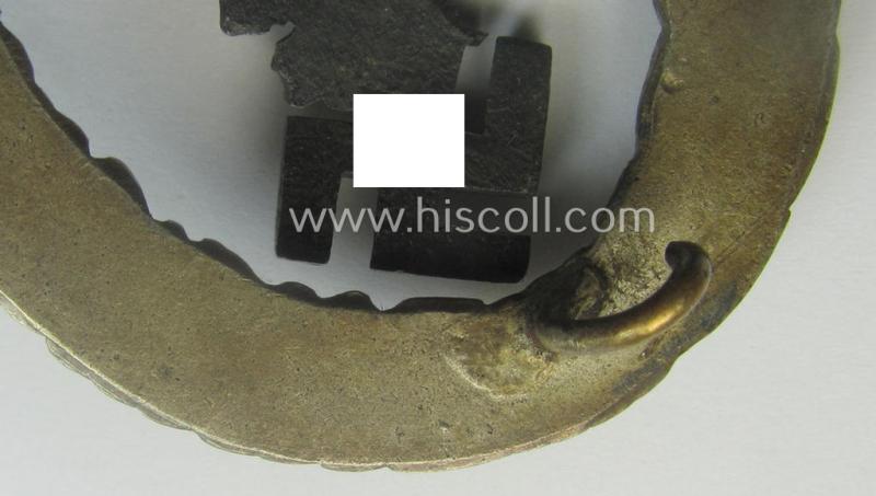 Early- (ie. pre-) war-period- and/or: 'Buntmetall'- (ie. 'Tombak'-) based: WH (Luftwaffe) 'Flugzeugführerabzeichen' (or: pilots-badge) being a maker- (ie. 'C.E. Juncker'-) marked example of the 'J2'-pattern