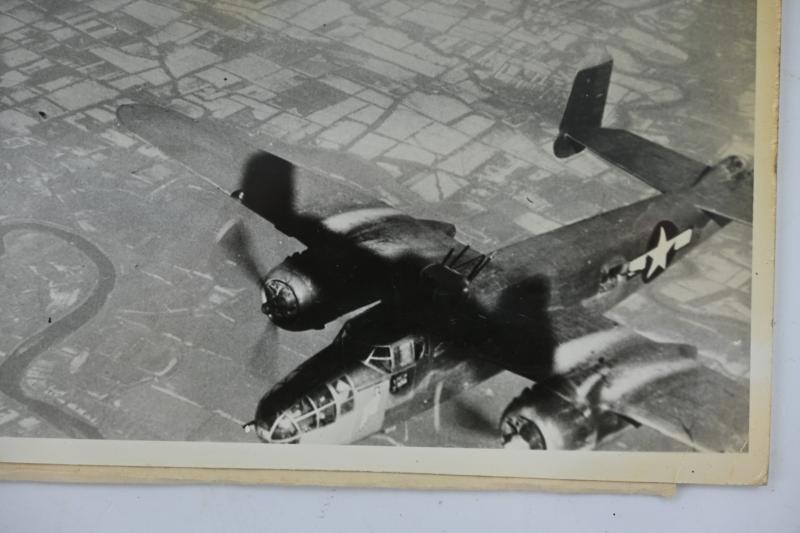 US WW2 Press Photo 'Flak damaged Bomber'