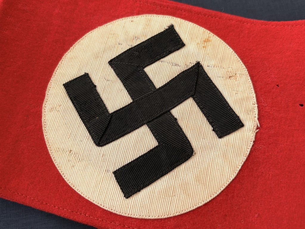 WWII GERMAN POLITICAL LEADERS’ THIRD REICH NAZI ARMBAND WITH RZM PAPER TAG.