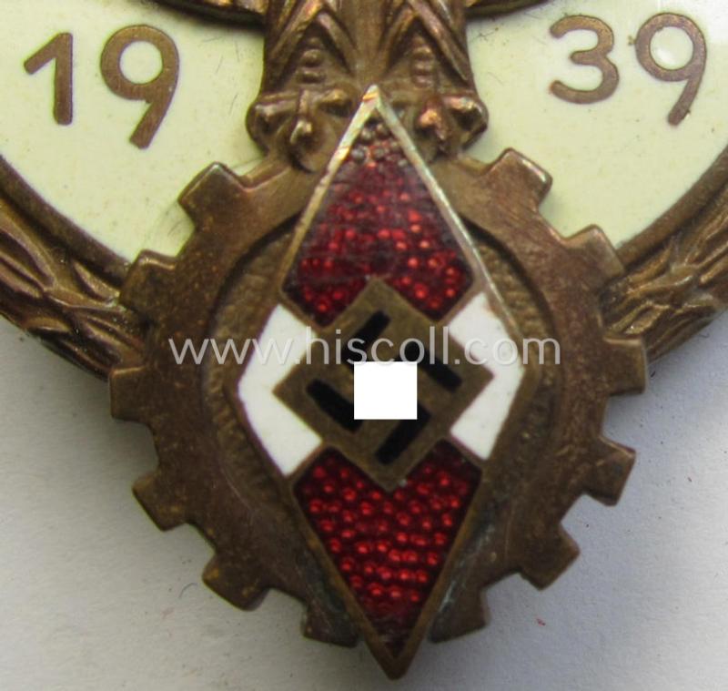 'HJ'- ('Hitlerjugend') ie. 'BDM'- ('Bund Deutscher Mädel') related: 'Reichsberufswettkampf-Siegerabzeichen' (of the 2nd model) entitled: 'Kreissieger 1939' and being a neatly maker- (ie.: 'H. Aurich'-) marked example