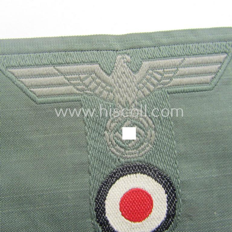 WH (Heeres) 'T-shaped' M42-model cap-eagle/cocarde as executed in 'BeVo'-weave pattern (being an attractive example that comes in a never used- nor cap-attached, condition)