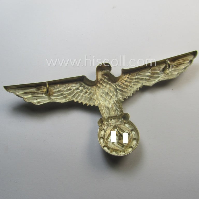 Larger-sized, WH (Kriegsmarine): 'DAK' (ie. 'Deutsches Afrikakorps') 'Buntmetall versilbertes' so-called: 'pith-helmet' eagle-device as intended for: 'Beamten der Kriegsmarine'