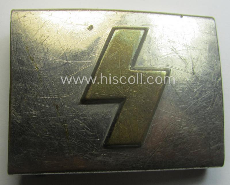 Complete(!) DJ (ie. 'Deutsches Jungvolk') silver-coloured- (ie. typical nickle-chromed) belt-buckle (ie. 'Koppelschloss') being a maker- (ie. 'RzM U.E. 72'-) marked example that comes mounted onto its (nicely marked), leather-based belt