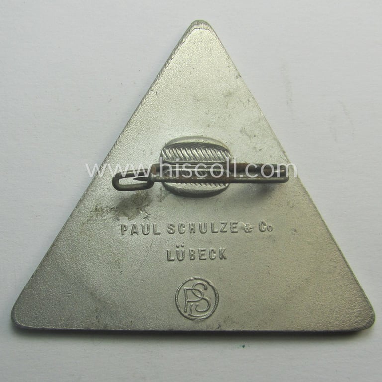 Commemorative, N.S.D.A.P.-related 'tinnie' depicting an illustration of a detailed 'swastika'-device coupled with the text: '10 Jahre N.S.D.A.P. - 15. December 1935 - Ortsgruppe Grevesmühlen'