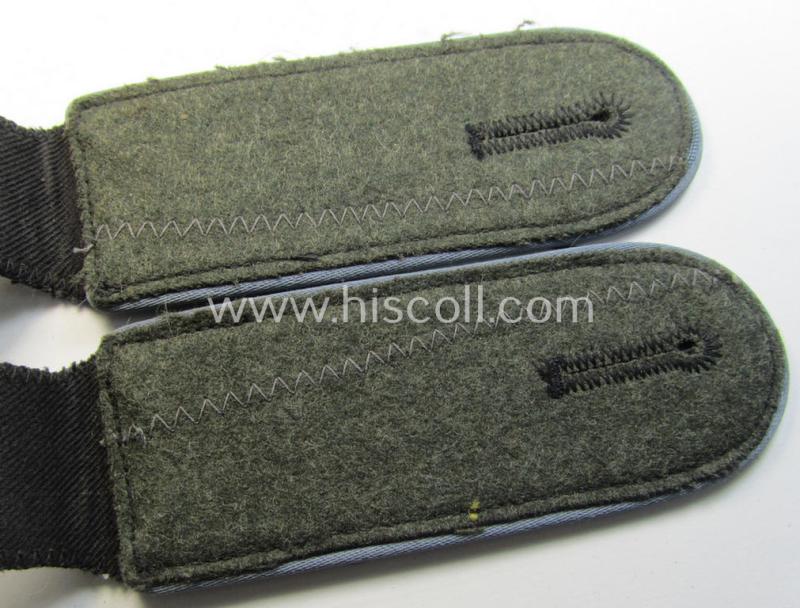 Attractive - and/or fully matching! - pair of Waffen-SS, enlisted-mens'-type shoulderstraps as piped in the light-blue-coloured branchcolour as was intended for usage by a soldier who served within the: 'Waffen-SS Nachschub-Truppen'