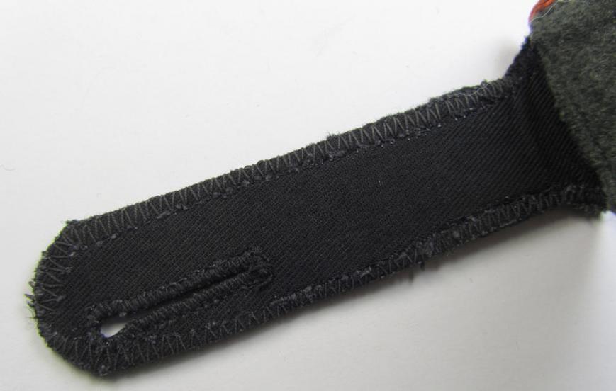 Attractive - albeit regrettably single! - Waffen-SS, enlisted-mens'-type shoulderstrap as was intended for usage by a: 'Soldat' (ie. 'SS-Mann') who served within the: 'Waffen-SS Feldgendarmerie-Truppen'