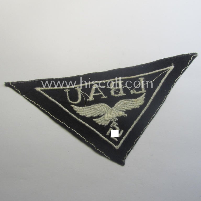 WH (Luftwaffe)-related- (EM- ie. NCO-pattern-) machine-embroidered breast-badge ie. eagle-device showing the text: 'L. Bau' as was (I deem) specifically intended for staff working within the WH 'Generalluftzeugmeister'- (ie. 'GL'-) organisation