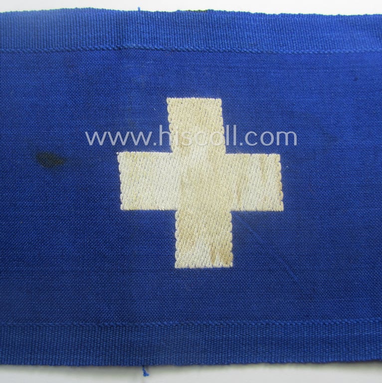Attractive - and scarcely found! - EM- (ie. NCO-) pattern, 'Reichsluftschutzbund' (ie. 'RLB'-) service-armband showing an interwoven white cross as intended for an: 'RLB-'Sanitäter o. Feldscher' (ie. air-raid-warden medic)