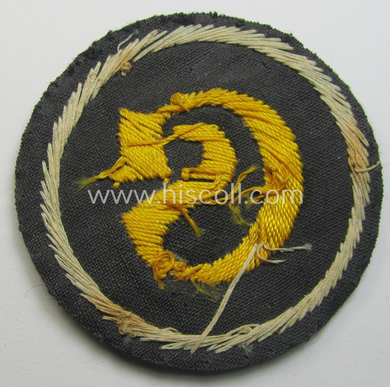 Attractive - and scarcely encountered! - WH (Heeres) hand-embroidered, trade- and/or special-career insignia (ie. 'Tätigkeitsabzeichen') as executed on a darker-green-coloured background, as was intended for a: 'geprüfter Schirrmeister'