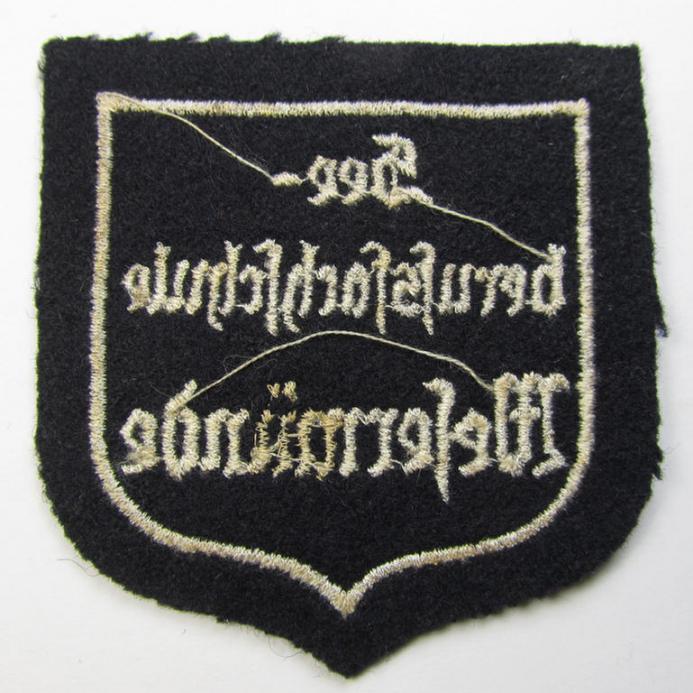 Superb - and with certainty very rarely encountered! - Marine-HJ (ie. 'Marine-Hitlerjugend') arm-badge (aka: 'Ärmelabzeichen') depicting the embroidered text: 'Seeberufsfachschule Wesermünde'