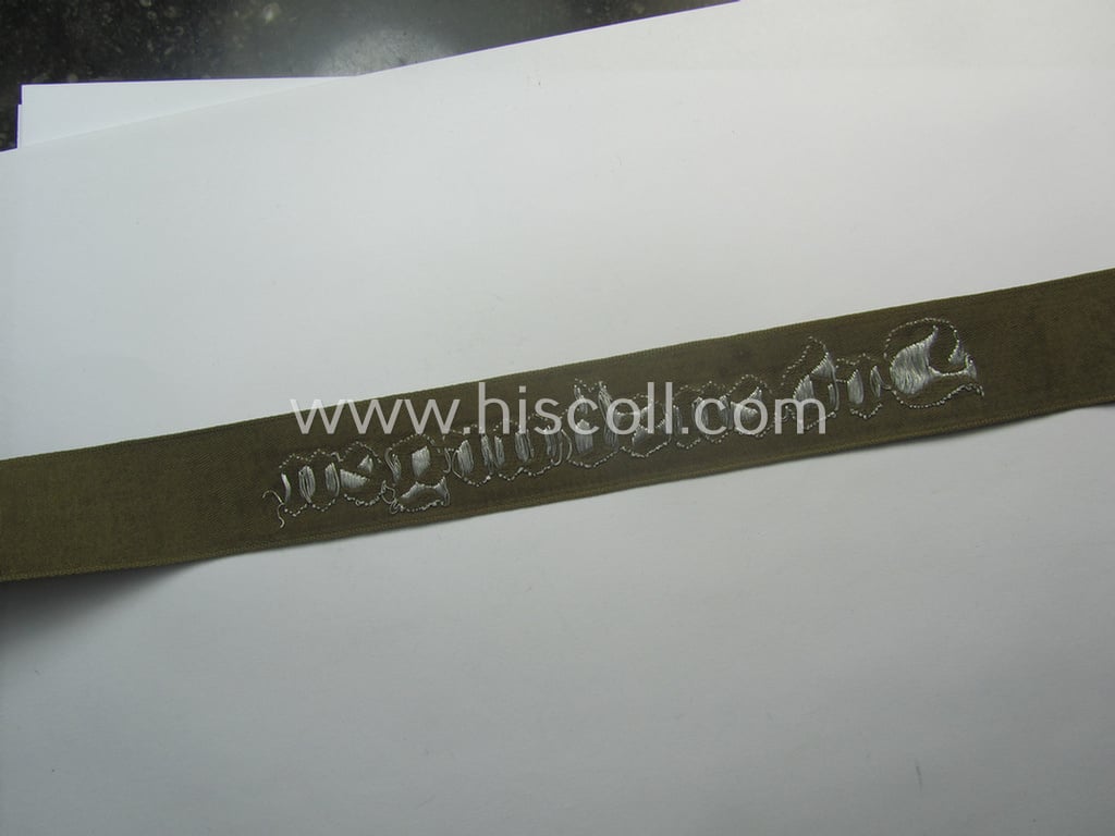 Superb - full length and 'flat-wire'-woven! - 'N.S.D.A.P.'- (ie. 'Politische Leiter'-) related cuff-title (ie. 'Ärmelstreifen') entitled: 'Ordensburgen' (being a 'virtually mint- ie. unissued' example that still retains its 'RzM'-etiket)