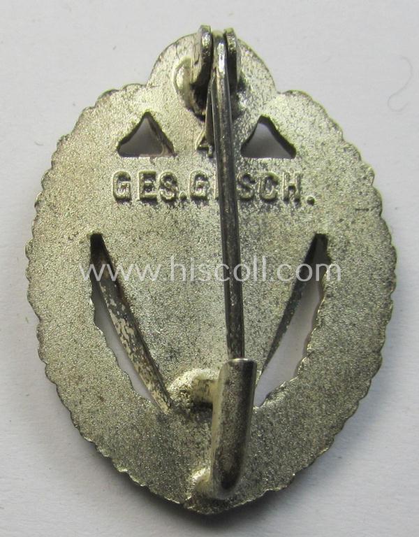 Honorary-membership lapel-pin (aka: 'Silberne Ehrennadel für 25 Jahre Mitgliedschaft im Nationalsocialistischer Reichskriegerbund' (ie. 'N.S.R.K.B.') being a maker- (ie. '4'-) marked example that also bears a: 'Ges.Gesch.'-designation on its...