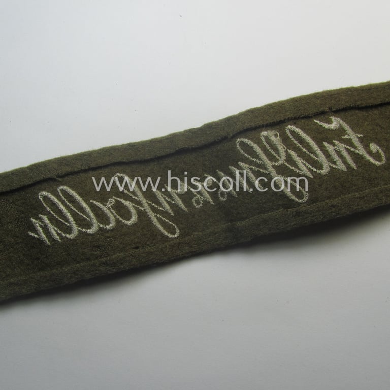 Never before seen - full length and with certainty scarcely encountered! - WH (Heeres) woolen-based so-called: 'FHH-Ärmelstreifen' (ie. cuff-title) as was intended for the soldiers- (ie. NCOs) serving within the: '60. Pz-Gren.-Div.' “Feldherrnhalle”