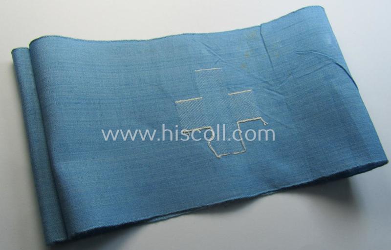 Superb, linnen-based- and/or light-blue-coloured armband (ie. 'Armbinde') depicting an interwoven white-toned cross as was intended for usage by a: 'Sanitäter o. Feldscher des Reichsluftschutz-Bundes'