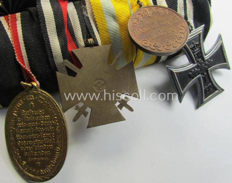 Attractive, 4-pieced WWI-period, medal-bar (ie. 'Ordenspange') resp. showing an: 'EK II.Kl', a: Sachsen 'Friedrich August'-medal, an: 'FKK 1914-18 mit Schw.' and a: 'Kyfhaüsserbund' commemorative-medal
