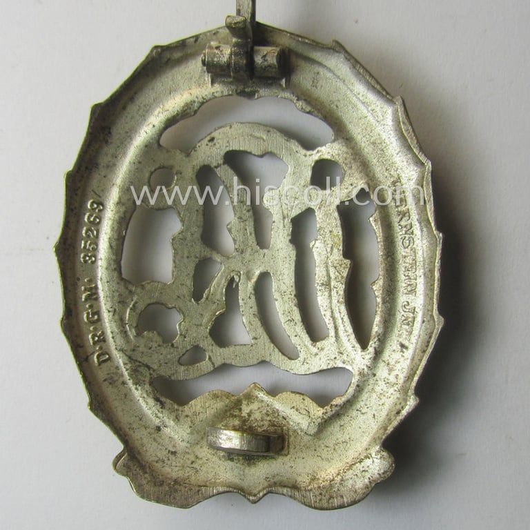 Scarcely seen, 'Reichssportabzeichen DRL für Kriegsversehrten' (or: DRL sports'-badge as was specifically intended for the war-disabled) being an example that is nicely maker- (ie. 'Wernstein - Jena'-) marked on its back