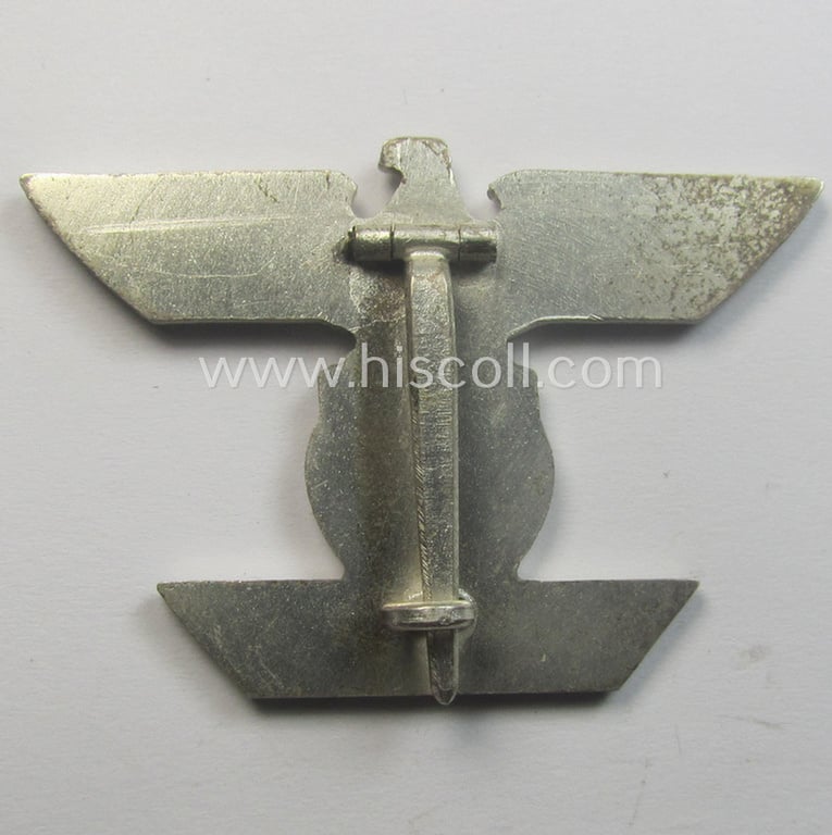 'Wiederholungsspange zum EK I. Klasse' (or: bar to the WWI IC first-class) by the maker (ie. 'Hersteller'): 'B.H. Mayer's Kunstprägeanstalt' and that comes stored in its accompanying etui